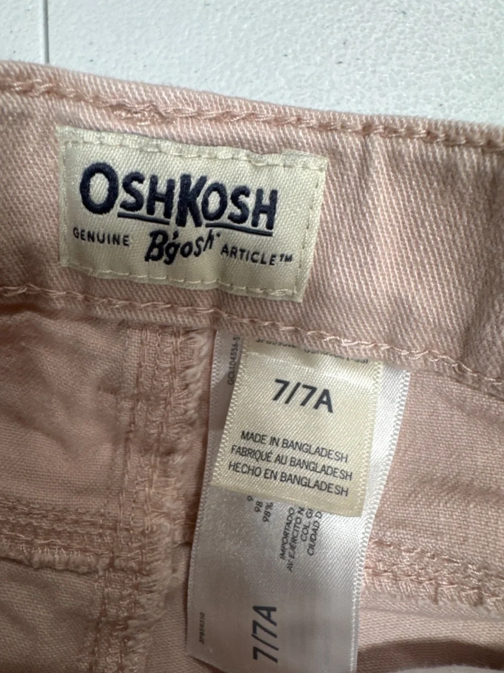 Oshkosh B’gosh pink denim pants Girls Size 7 adjustable waist raw hem